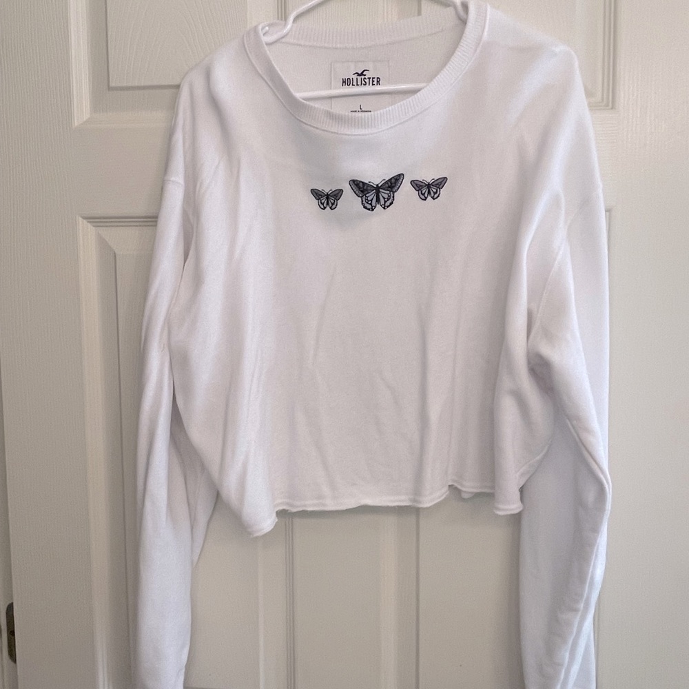 White sweatshirt with butterflies